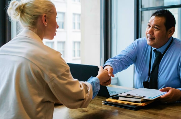 Two people shaking hands